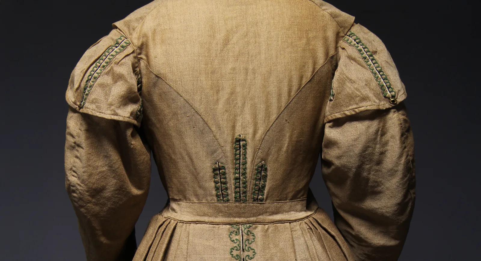 Close-up of embroidered back detail on a vintage 19th-century dress, from Australia’s most visited outdoor museum and heritage attraction.